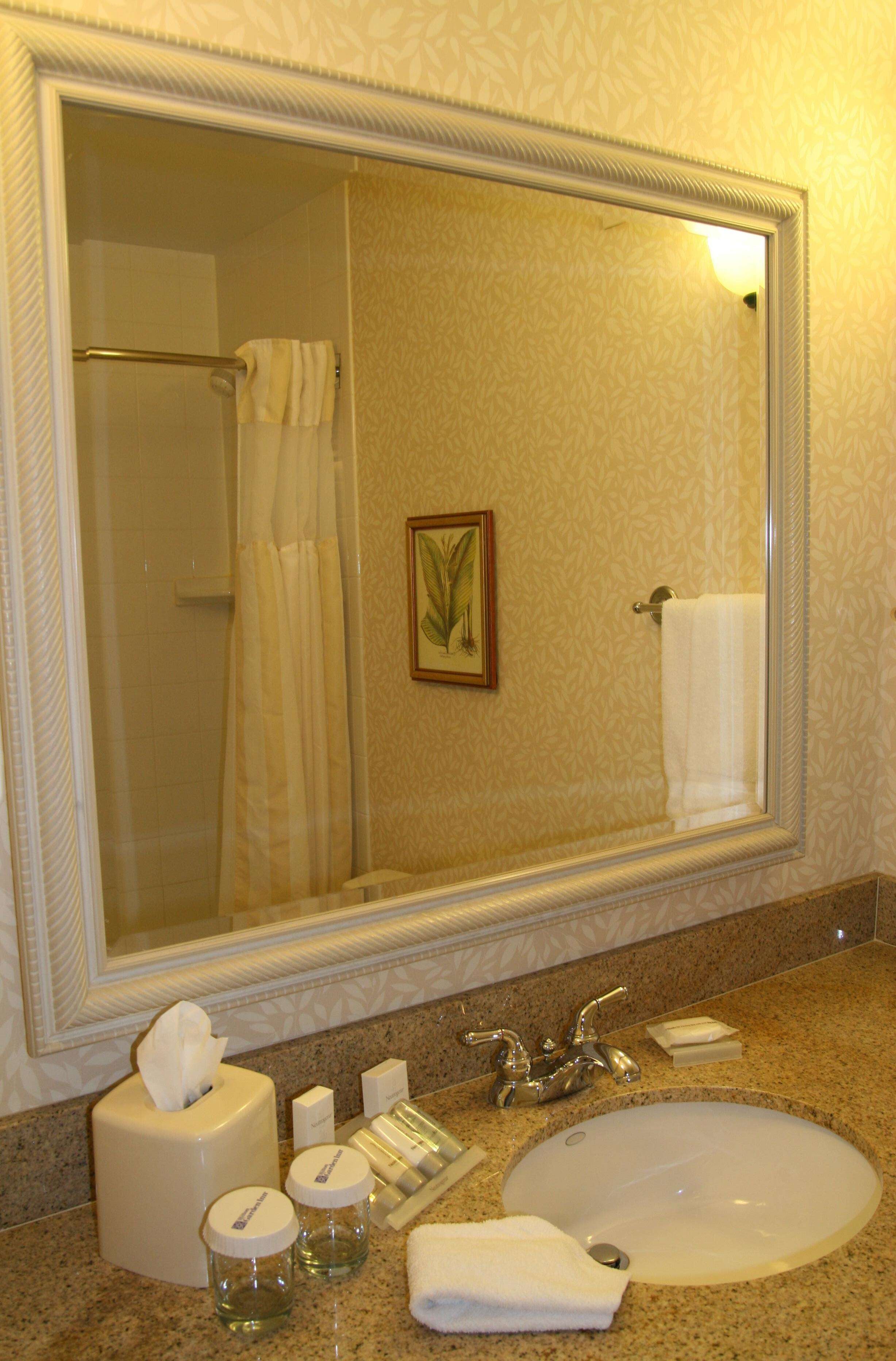 bathtub, free toiletries, hair dryer, towels