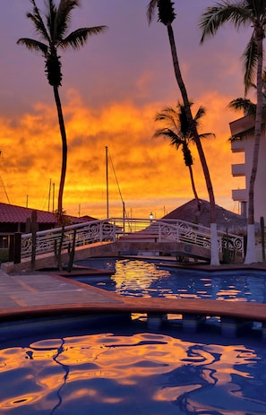 Outdoor pool, pool umbrellas, pool loungers