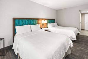 Hypo-allergenic bedding, pillowtop beds, desk, blackout drapes
