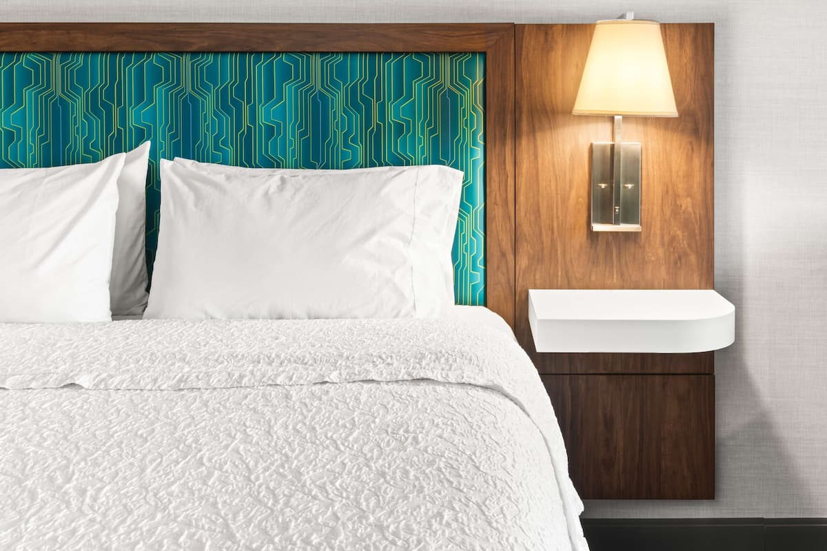 Hypo-allergenic bedding, pillowtop beds, desk, blackout drapes