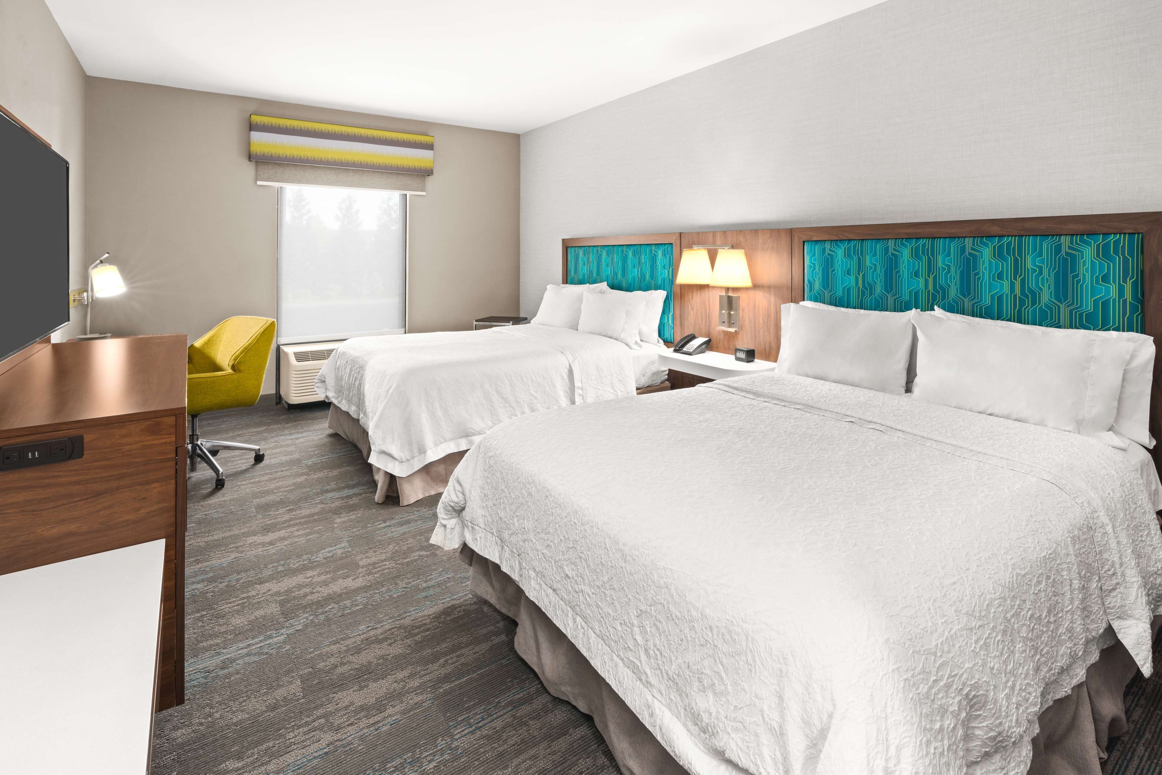 hypo-allergenic bedding, pillow-top beds, desk, blackout curtains