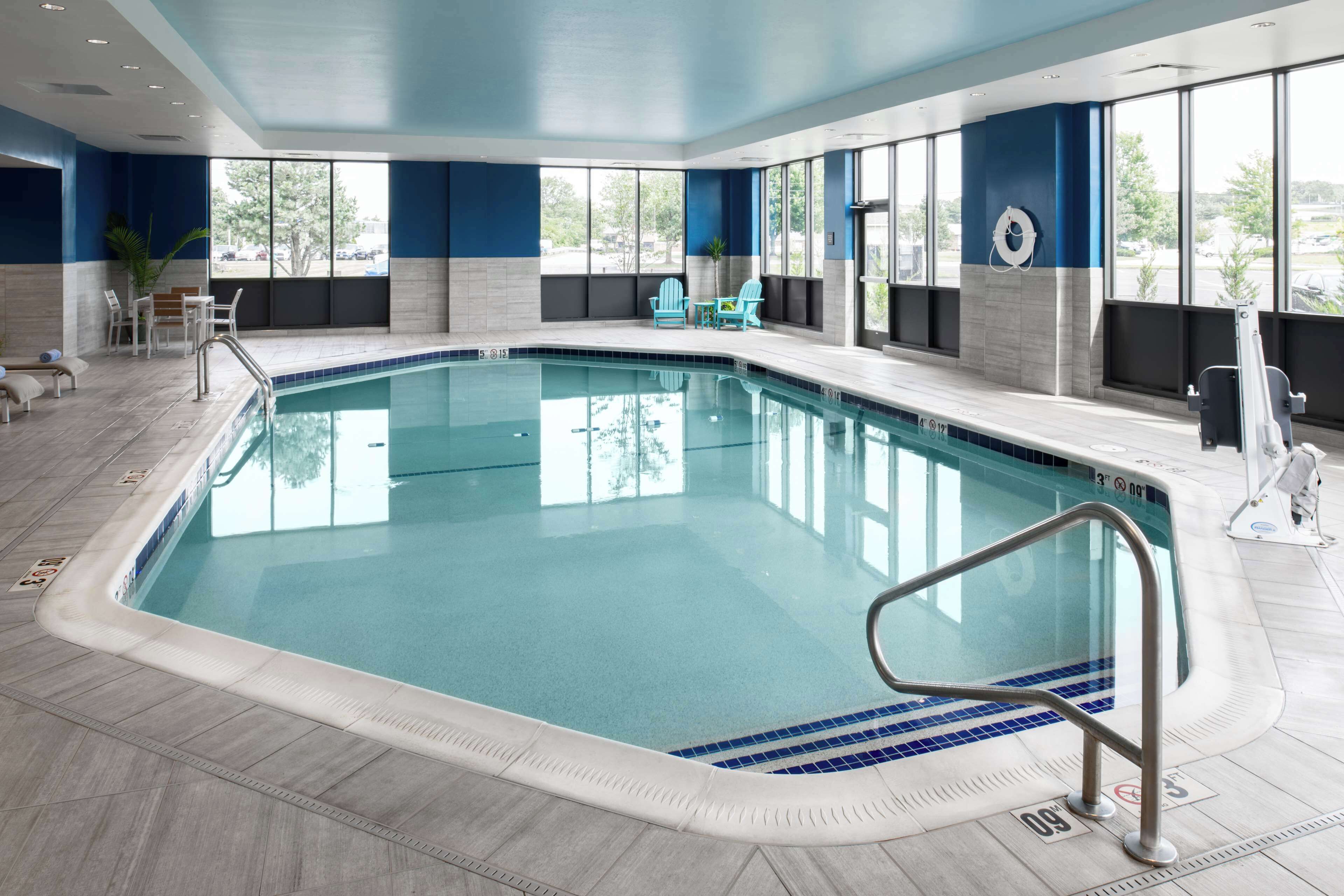 seasonal outdoor pool, open 9:00 am to 9:00 pm, pool umbrellas