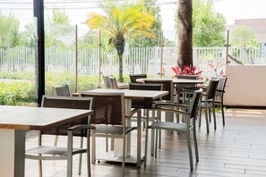 Breakfast, lunch, dinner served; al fresco dining 