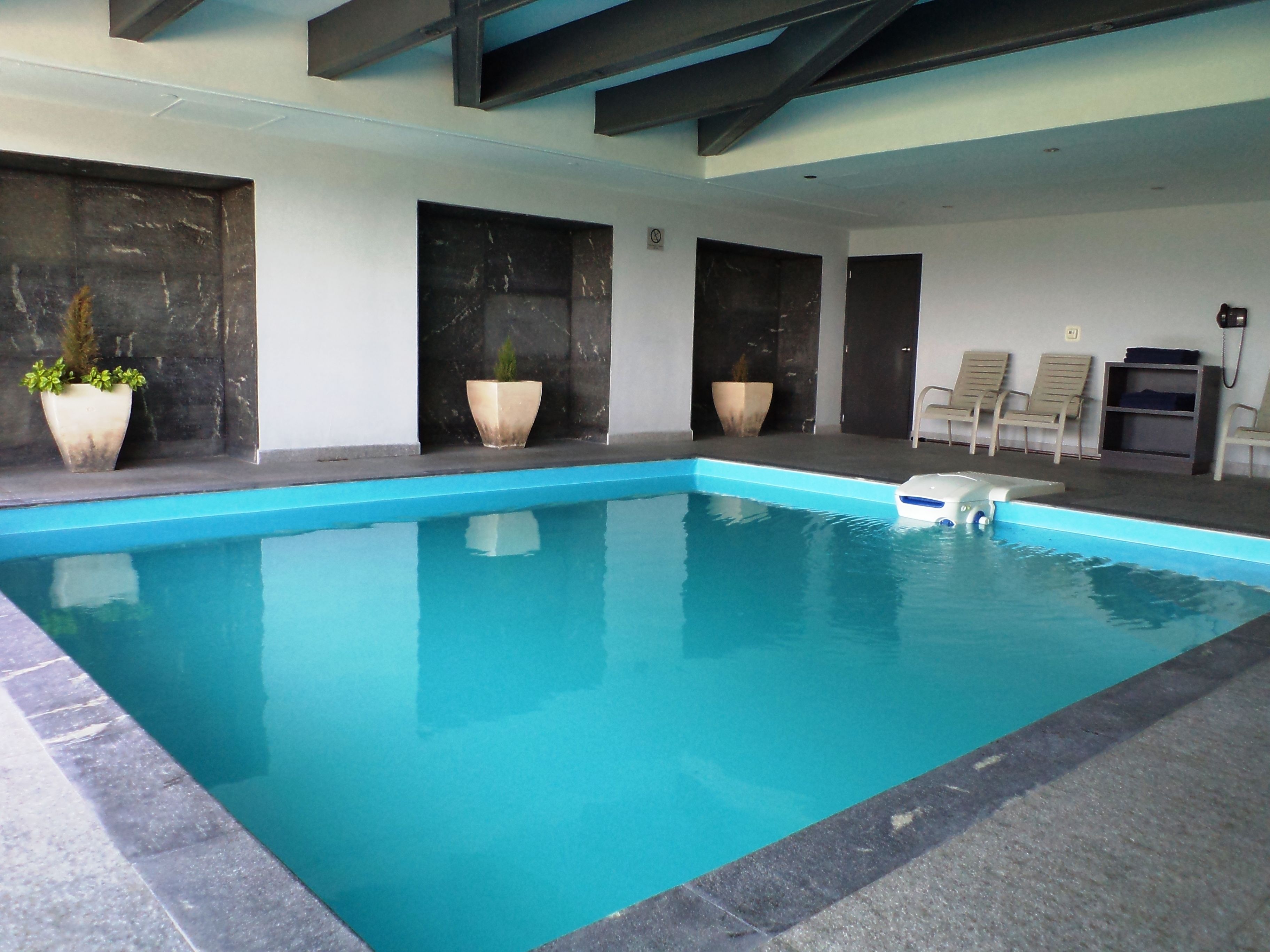 indoor pool, open 8:00 am to 9:00 pm, pool loungers