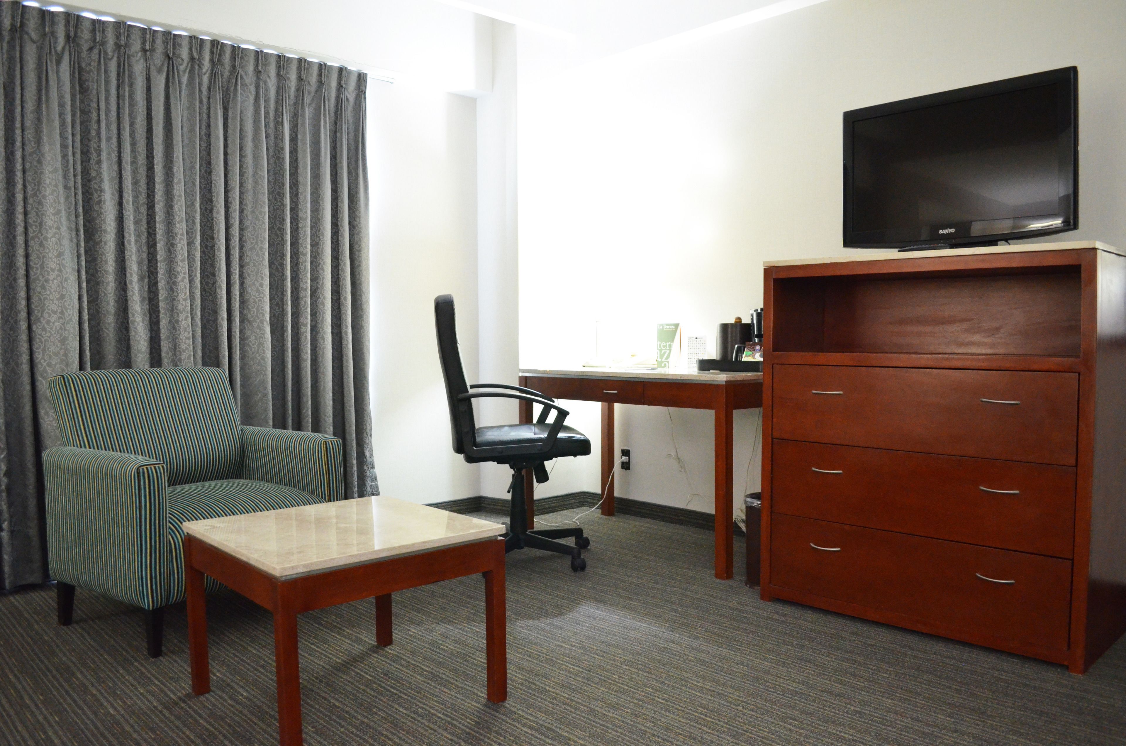 premium bedding, down duvets, minibar, in-room safe