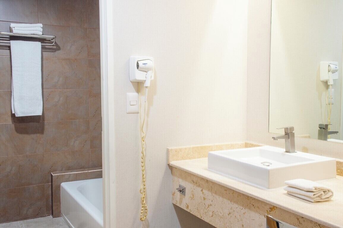 suite, 1 king bed | bathroom | free toiletries, hair dryer, towels, soap