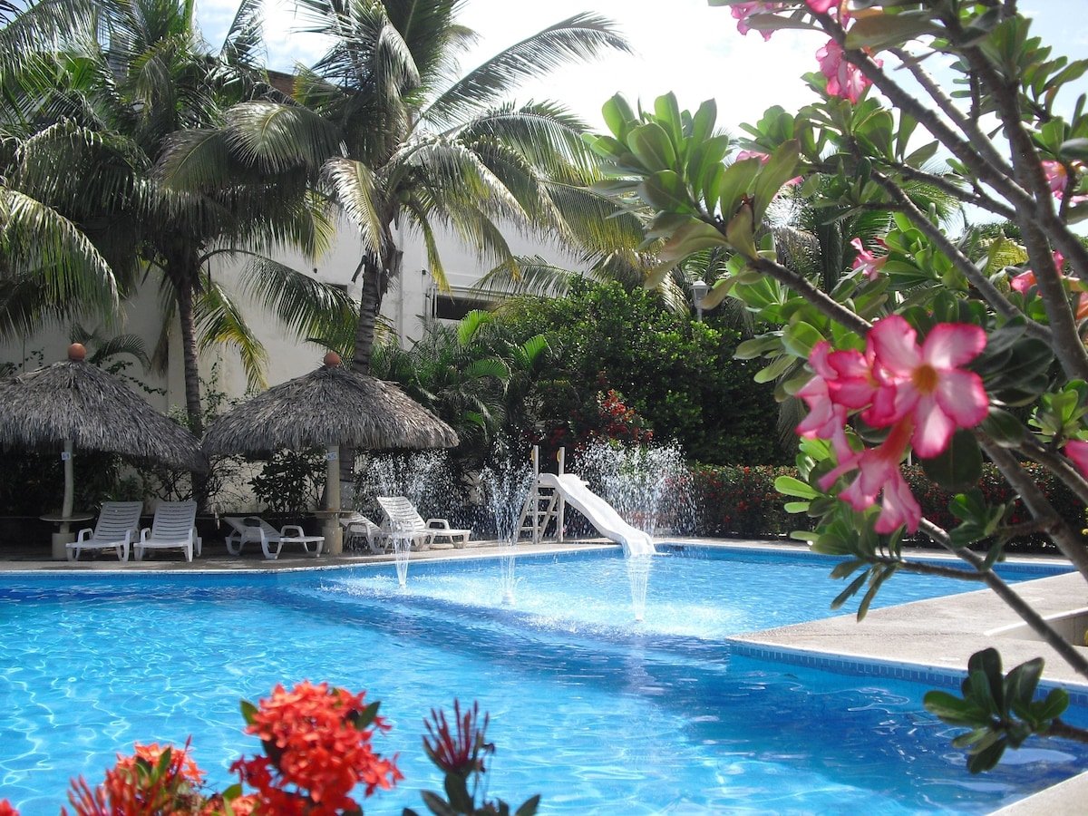 pool area at hotel castillo huatulco