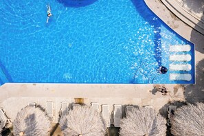 2 outdoor pools, open 9:00 AM to 9:00 PM, pool umbrellas, sun loungers