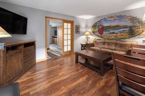 Una televisión de pantalla plana, un reproductor de DVD