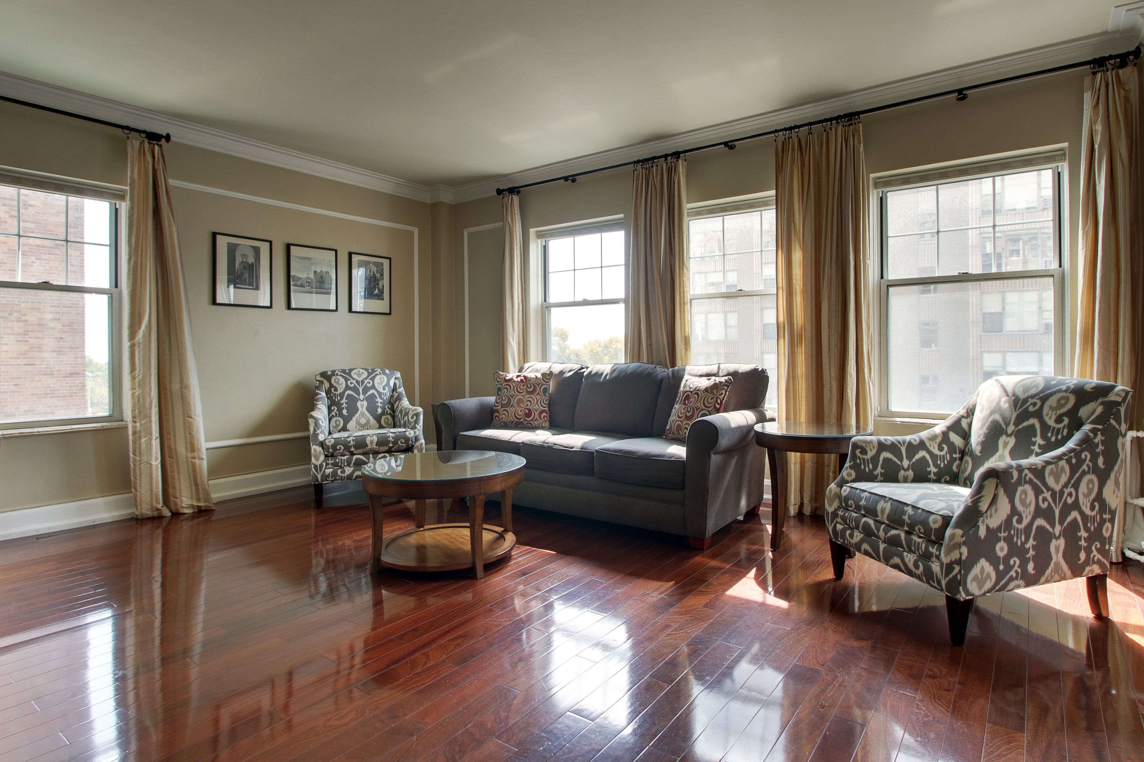 executive suite, 2 bedrooms, city view | living area | flat-screen tv