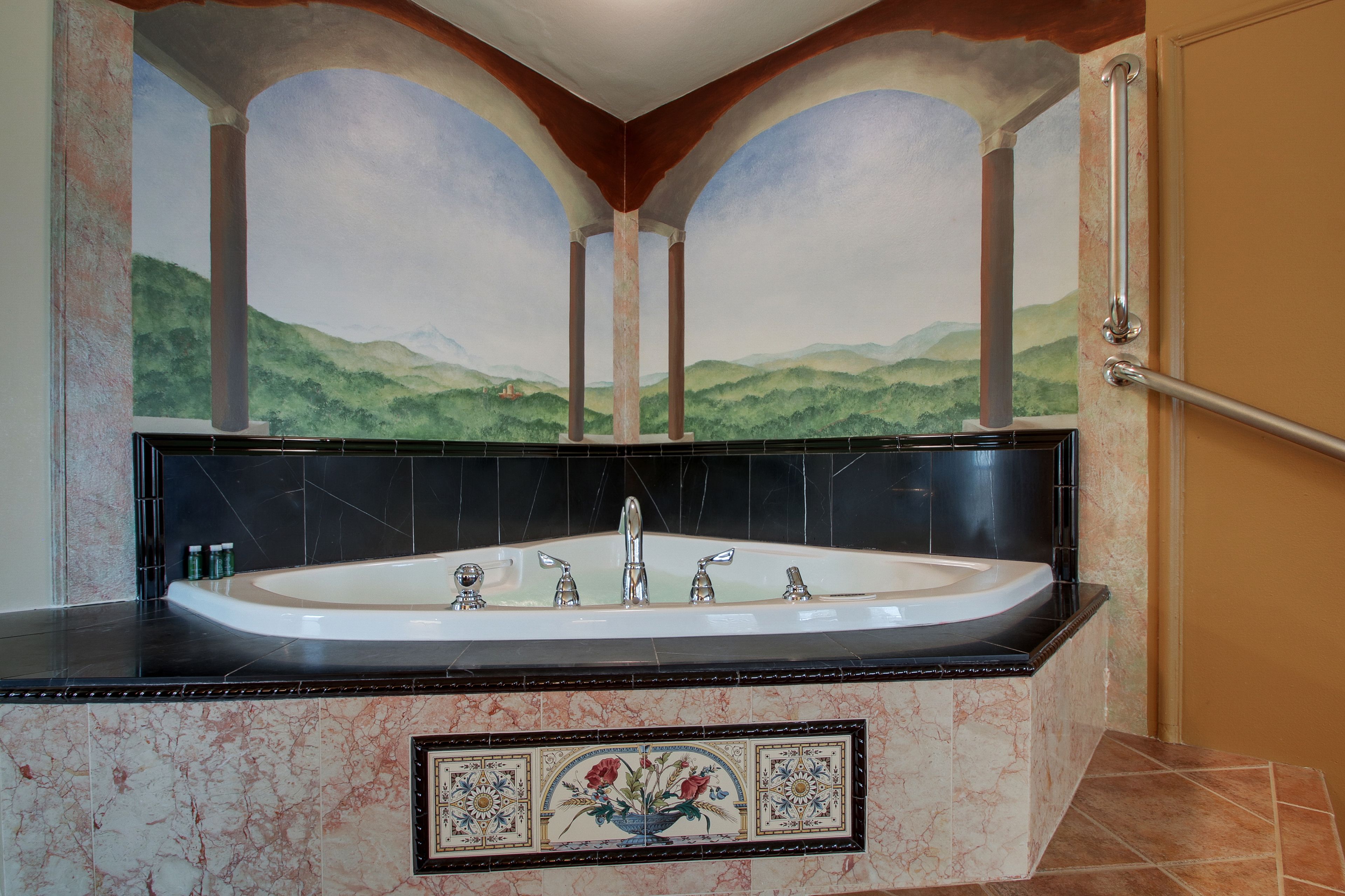 romantic suite, 1 bedroom, jetted tub, city view | deep-soaking bathtub