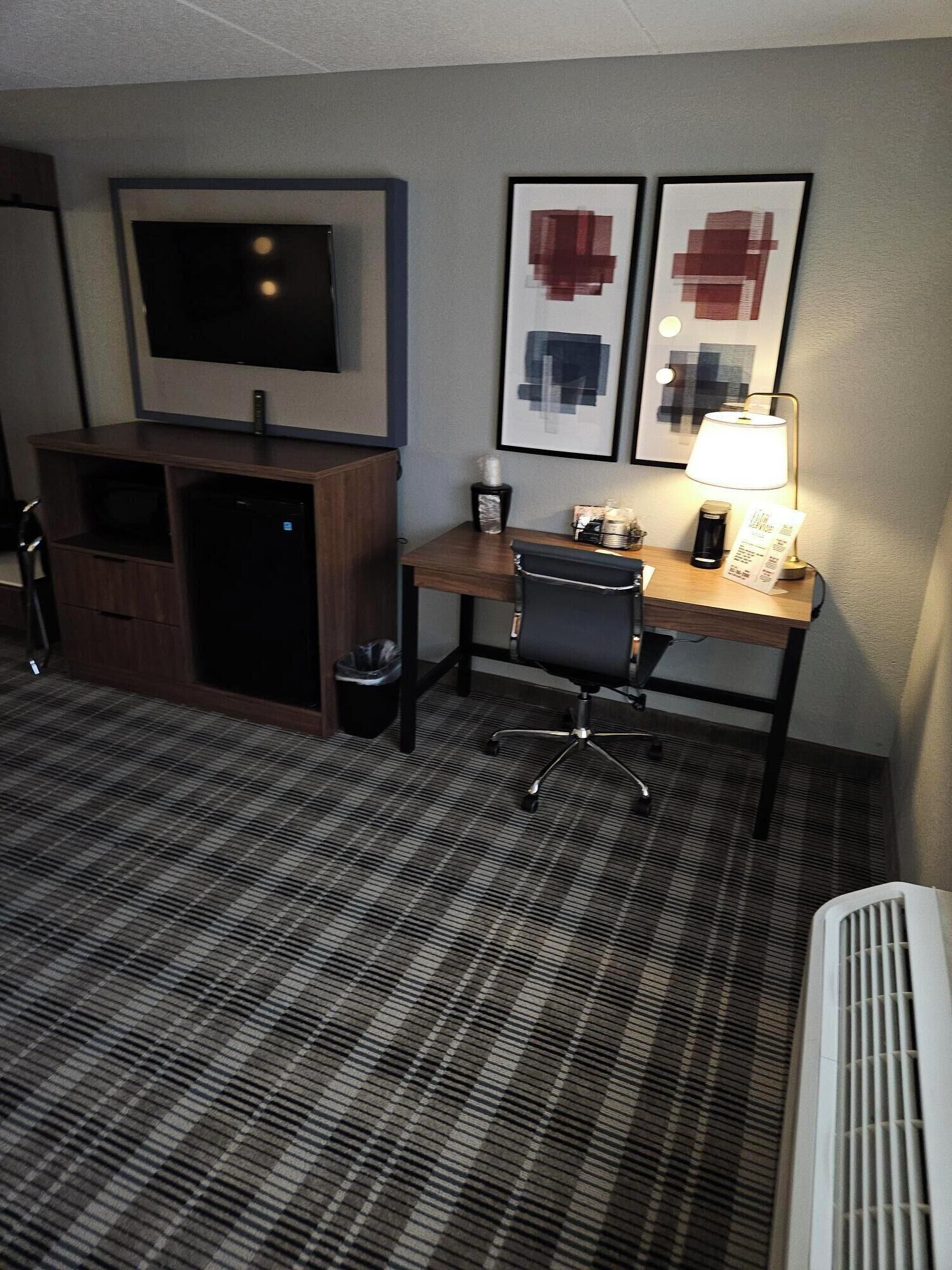 desk, blackout curtains, iron/ironing board, free cots/infant beds