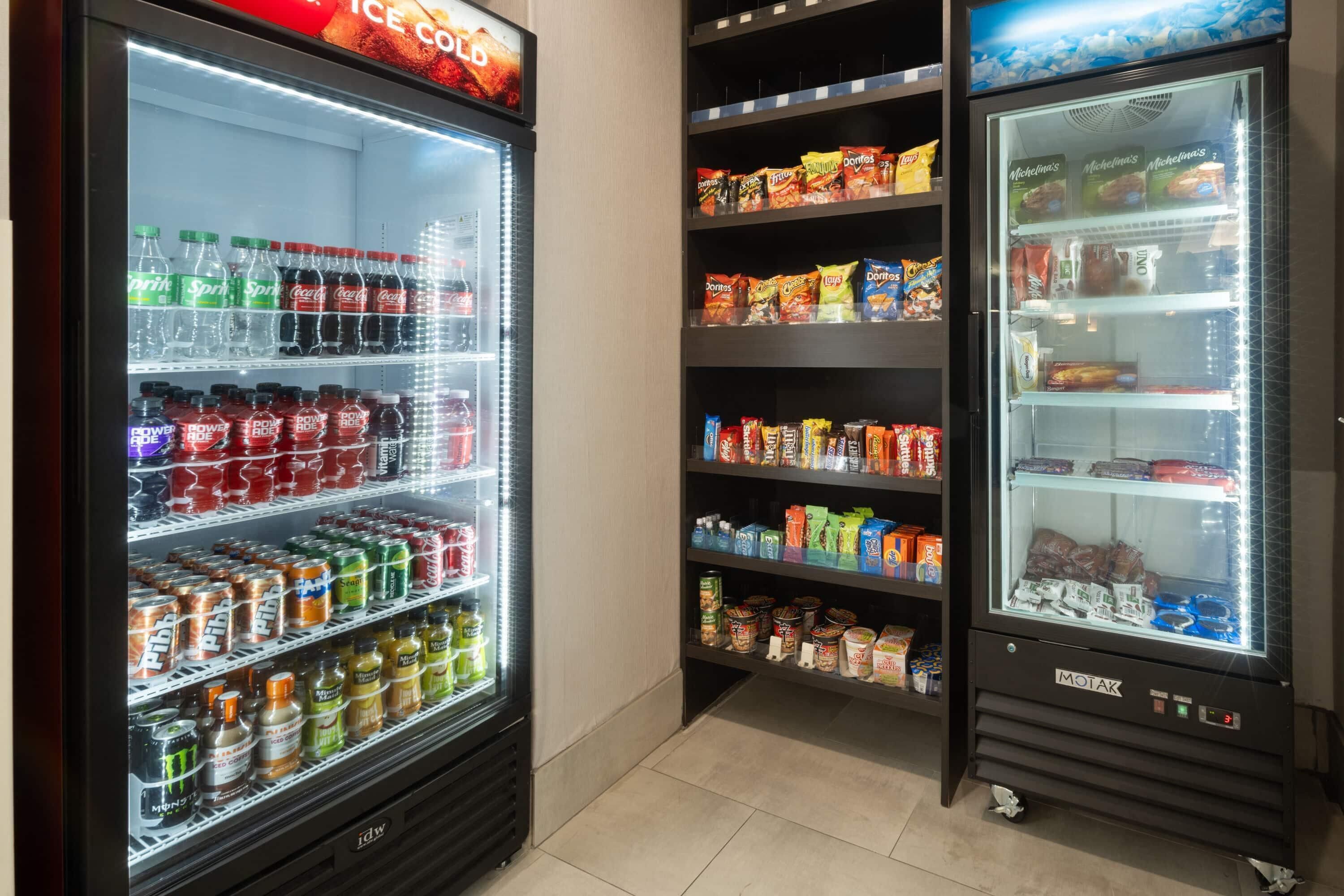 A vending machine area with various snacks and drinks.