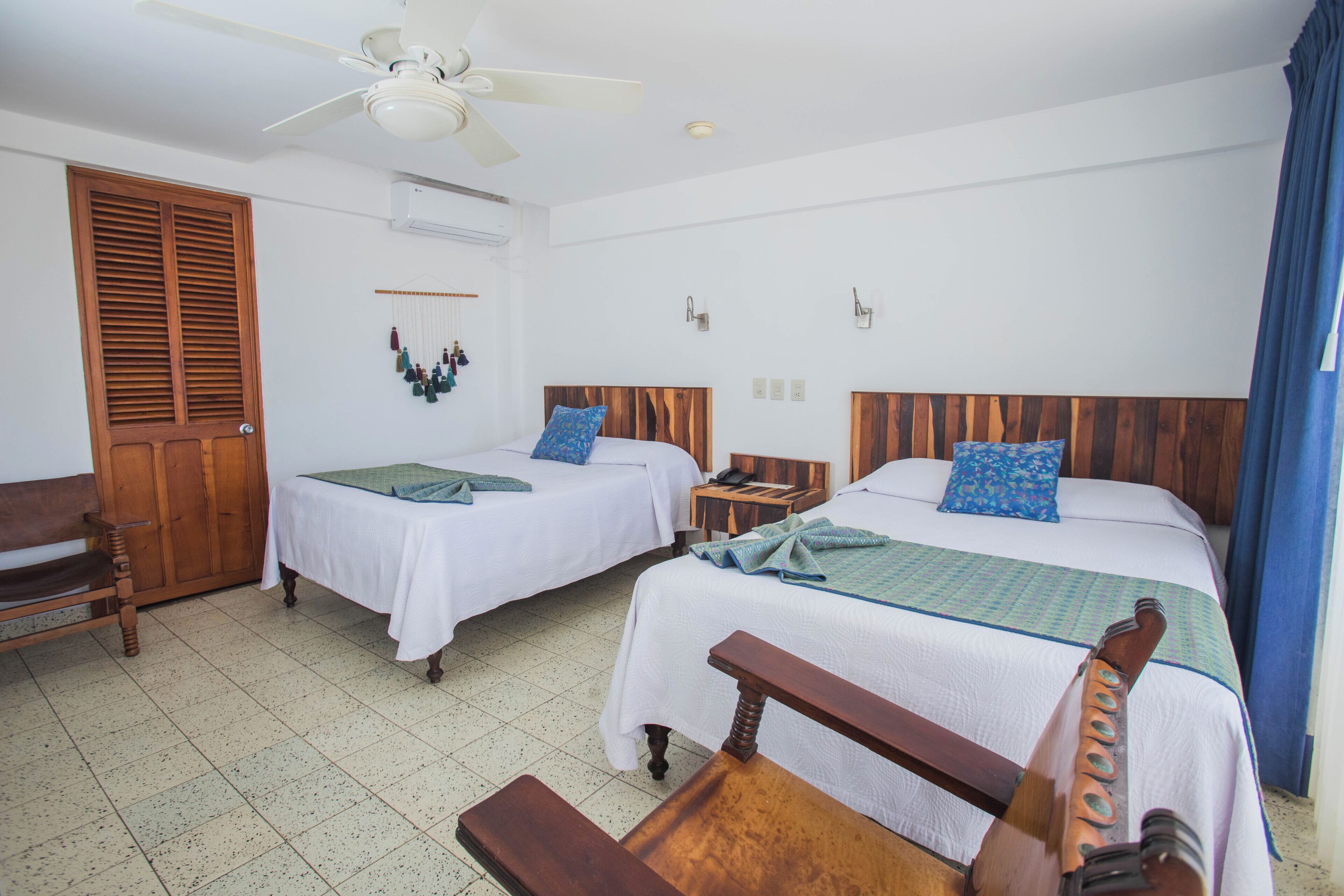 Standard Room, 2 Double Beds, Partial Ocean View | Premium bedding, in-room safe, desk, iron/ironing board