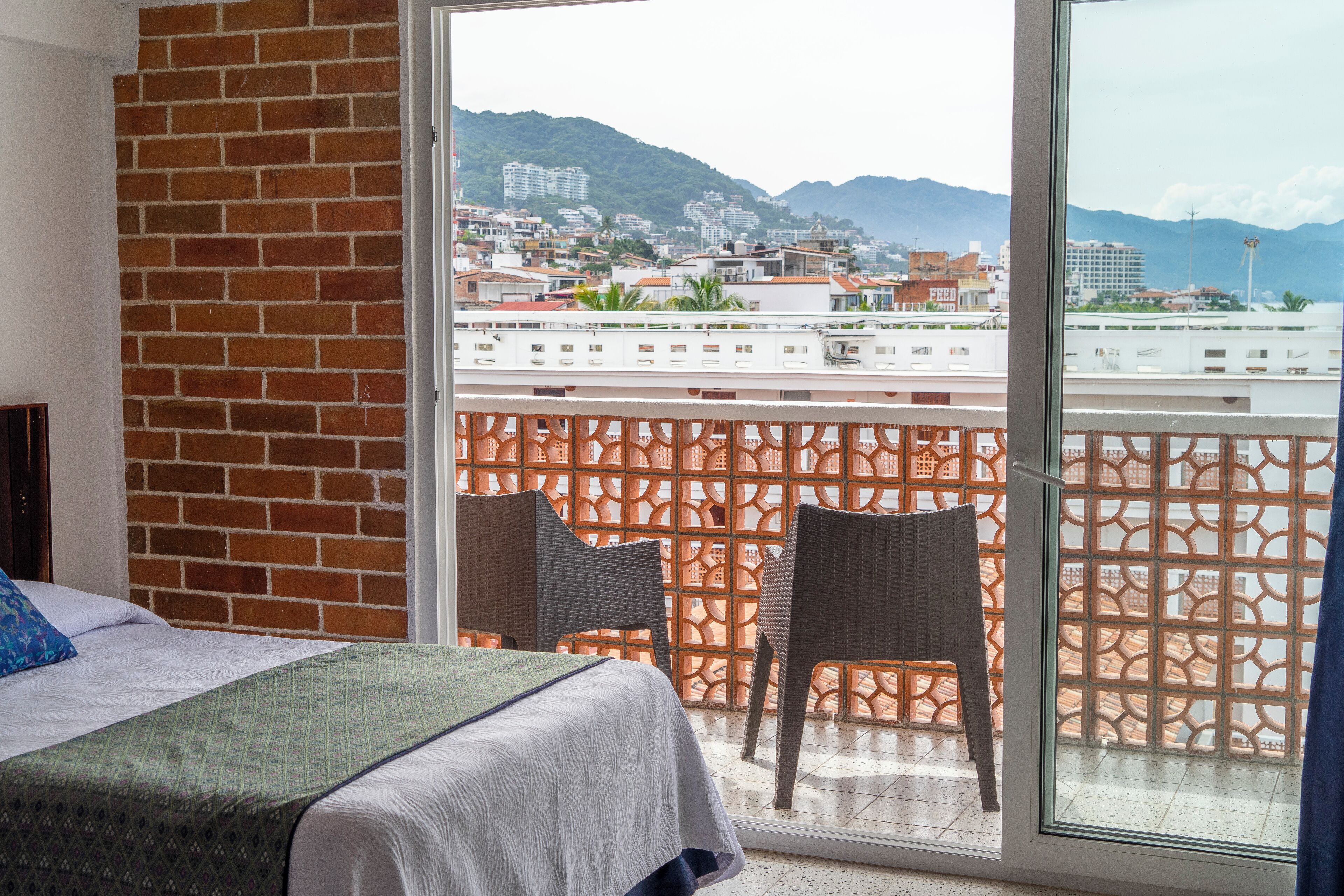 standard room, 2 double beds, partial ocean view | premium bedding, in-room safe, desk, iron/ironing board