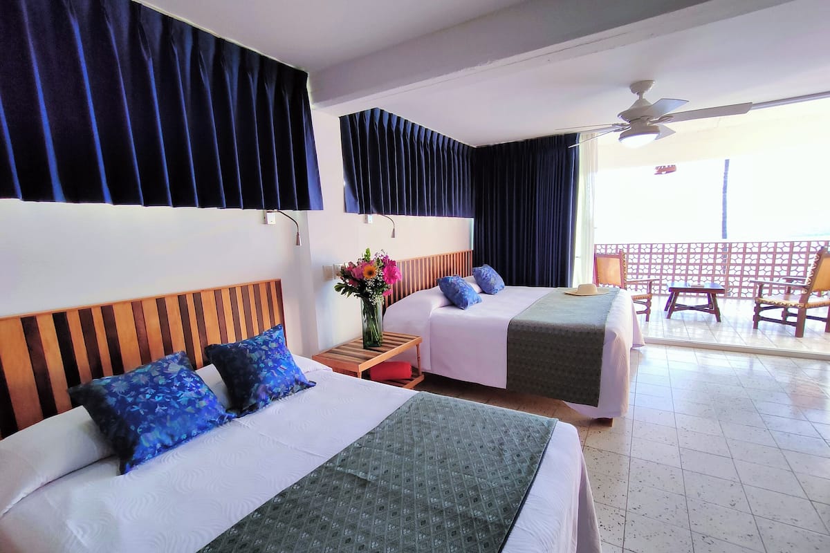 superior room, ocean view | premium bedding, in-room safe, desk, iron/ironing board