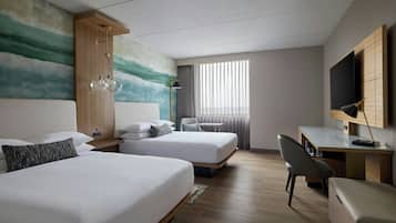 Premium bedding, down comforters, pillowtop beds, in-room safe