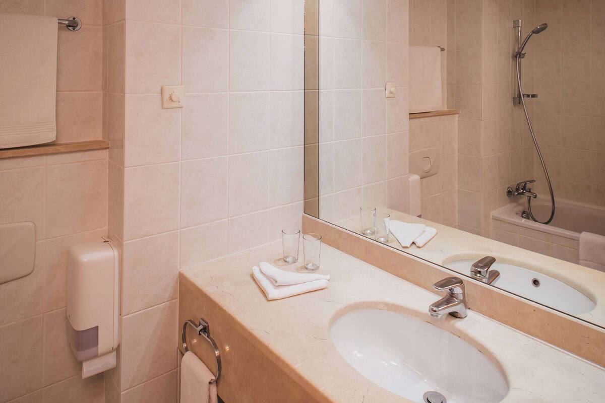 free toiletries, hair dryer, slippers, towels