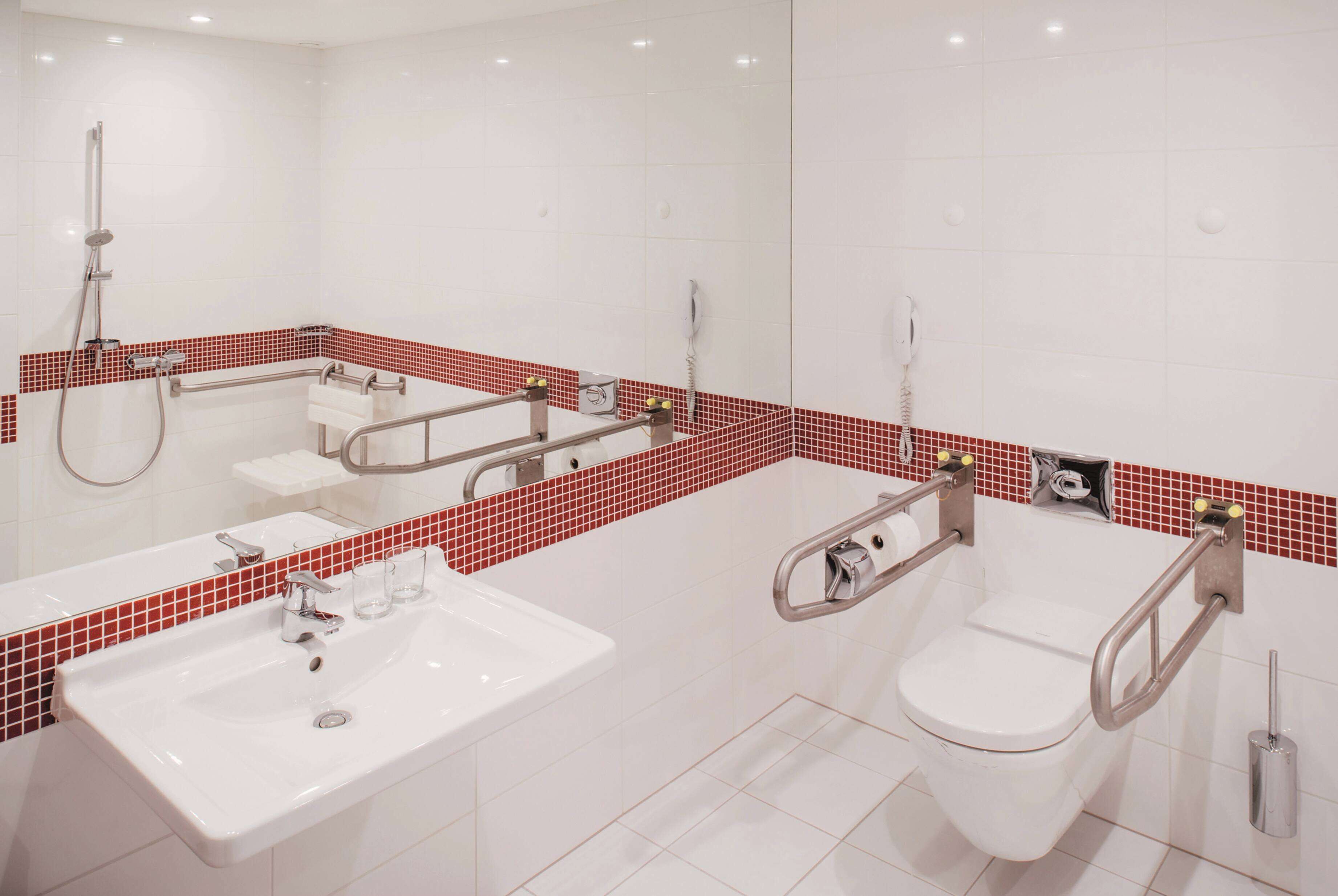 comfort room, accessible | bathroom | free toiletries, hair dryer, slippers, towels