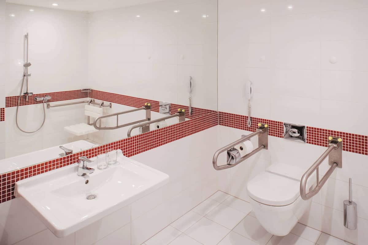 comfort room, accessible | bathroom | free toiletries, hair dryer, slippers, towels