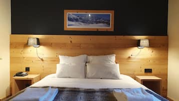 Coffres-forts dans les chambres, bureau, fer et planche à repasser