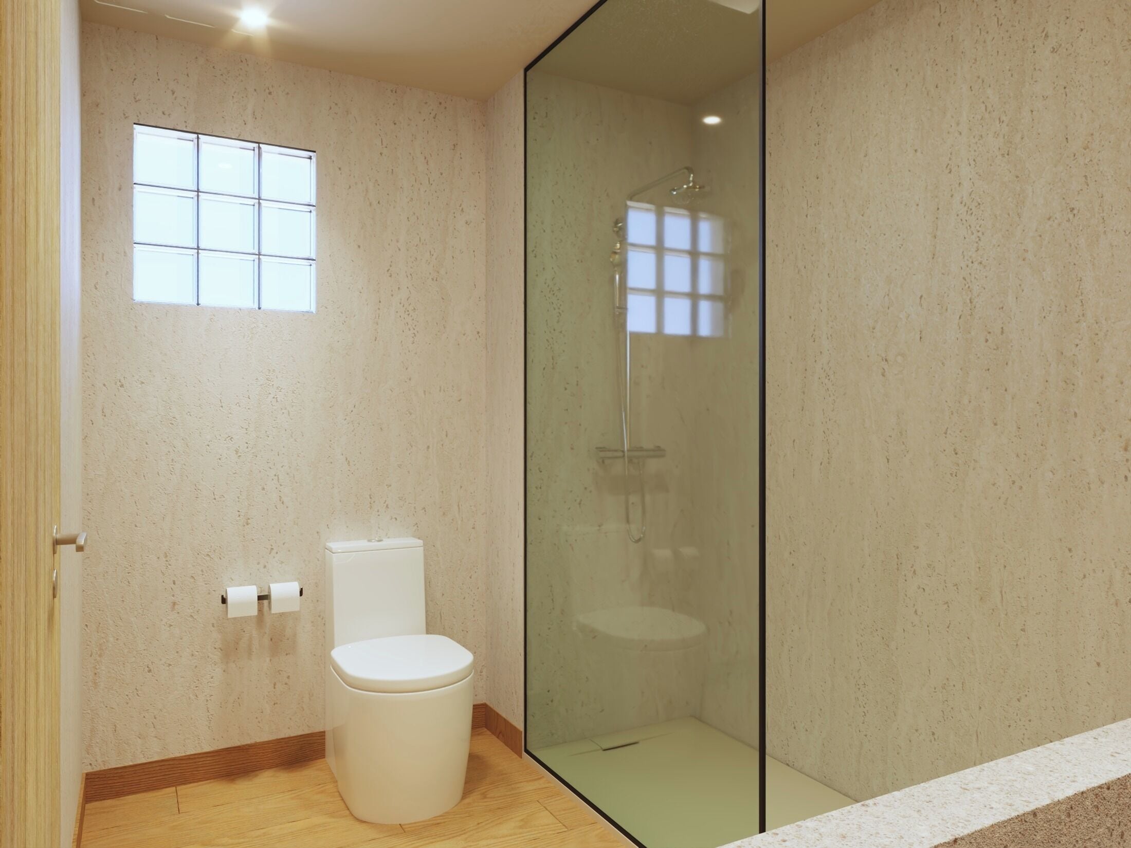 A bathroom with a toilet, a glass-enclosed shower, and a small window.