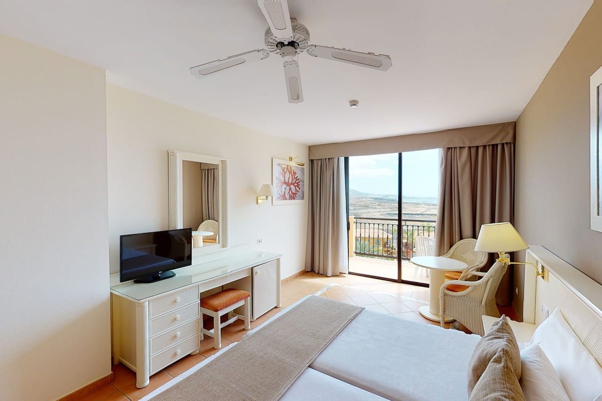 desk, blackout curtains, free wifi, bed sheets