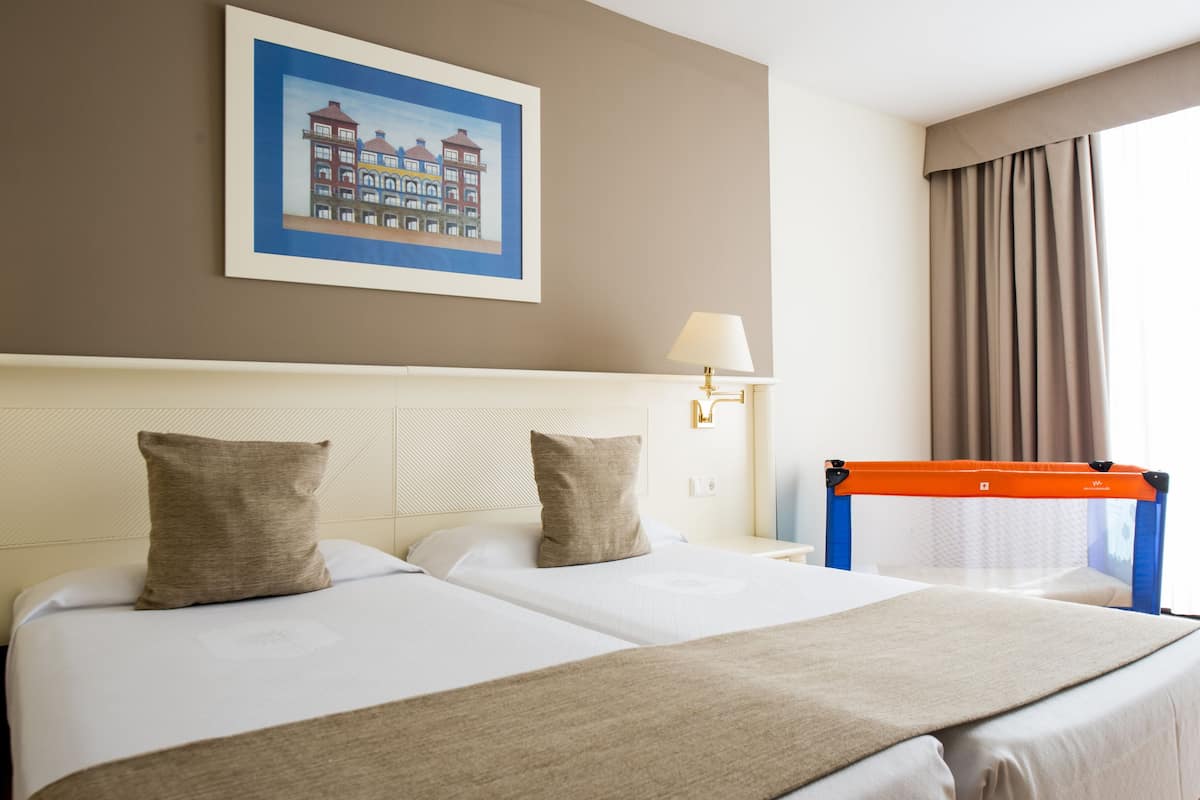 desk, blackout curtains, free wifi, bed sheets