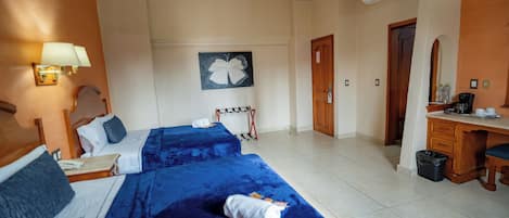 Standard Quadruple Room, 2 Double Beds | In-room safe, desk, iron/ironing board, free WiFi