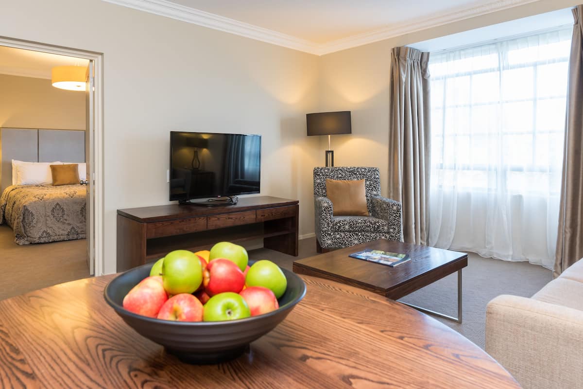 Junior Suite | 1 bedroom, in-room safe, desk, laptop workspace