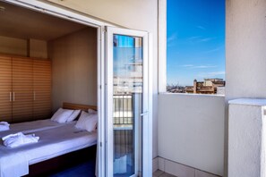 Cobertura, vista para a cidade | Vista do quarto