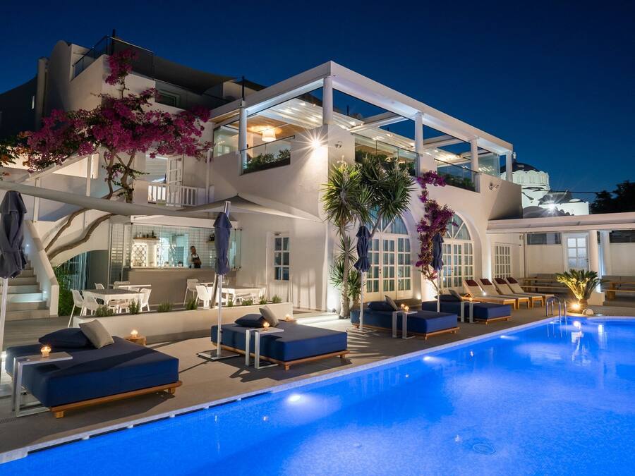 Seasonal outdoor pool, open 8 AM to 7:00 PM, pool umbrellas