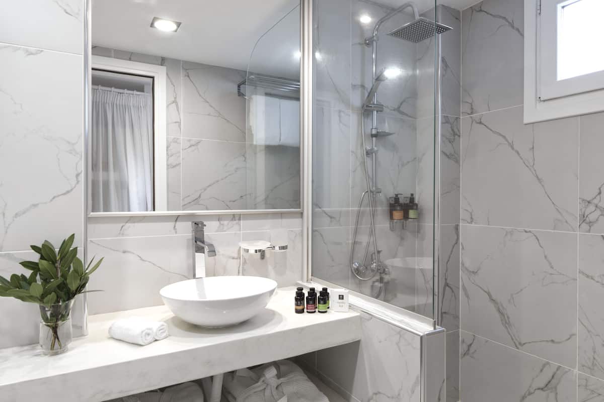 shower, designer toiletries, hair dryer, bathrobes