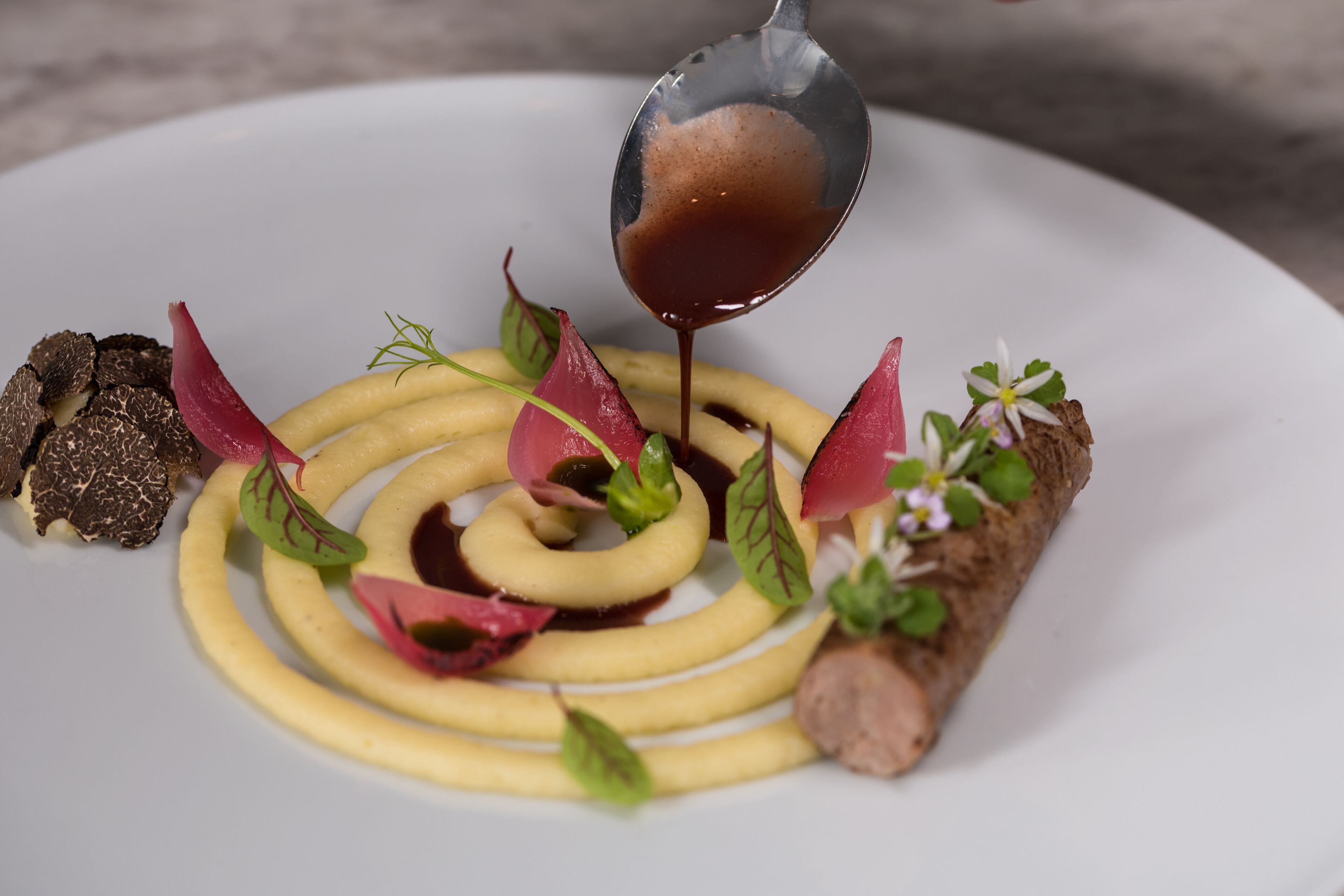 Lunch, dinner served; local and international cuisine, pool views 