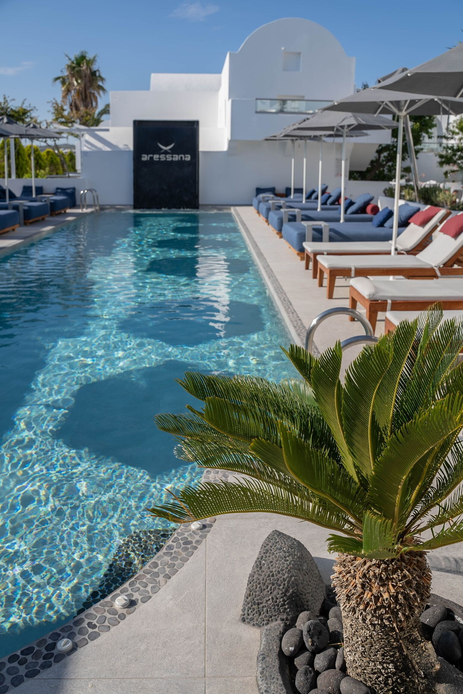 Seasonal outdoor pool, open 8 AM to 7:00 PM, pool umbrellas