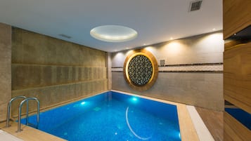 Indoor pool, sun loungers