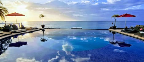 Outdoor pool, pool umbrellas, pool loungers