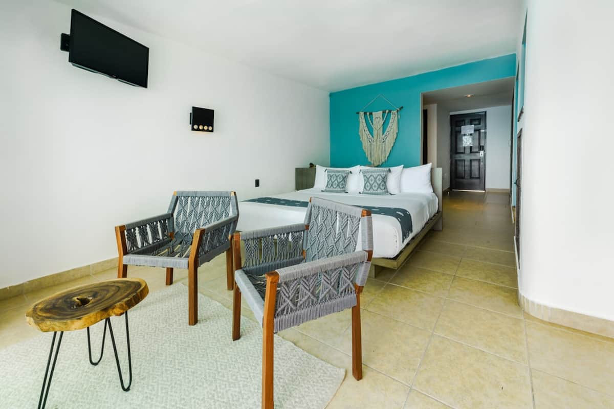 Deluxe Room | 1 bedroom, in-room safe, individually decorated, individually furnished