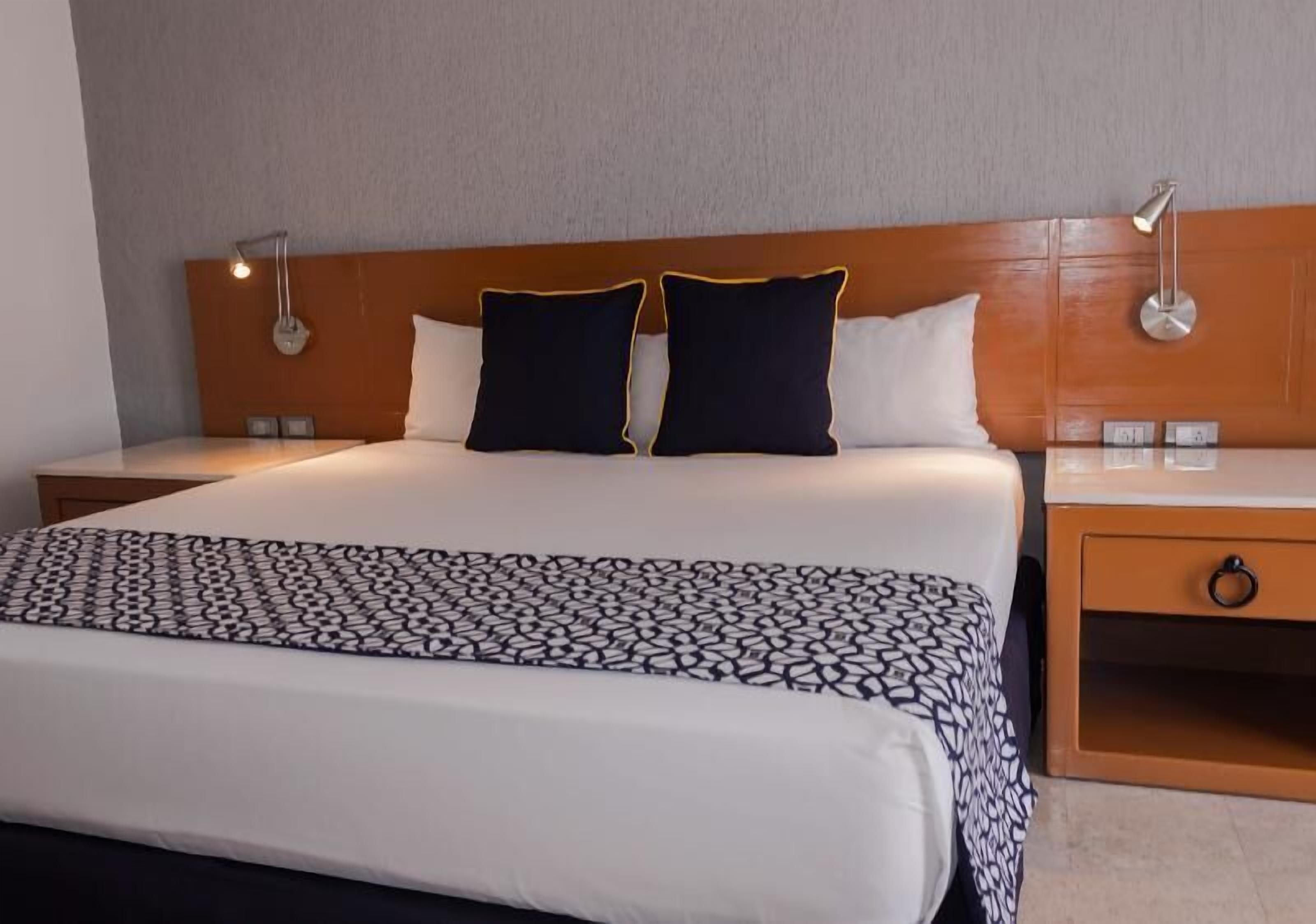 Individually furnished, blackout drapes, bed sheets