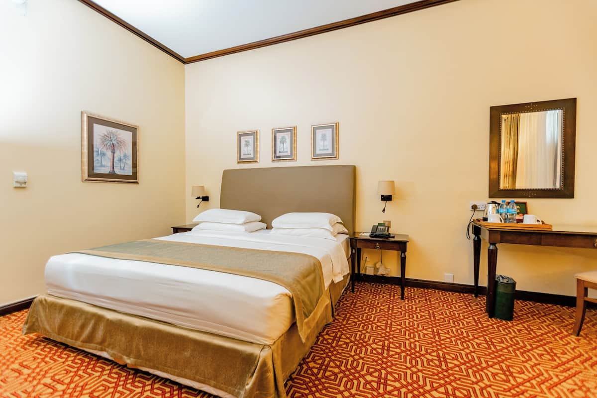 Standard Room, City View | 1 bedroom, minibar, in-room safe, desk