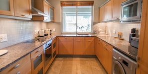 Luxury Apartment, 1 Bedroom | Private kitchen | Full-sized fridge, microwave, oven, stovetop