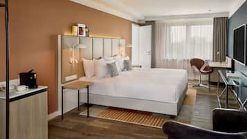 Rom – executive, 1 kingsize-seng, byutsikt | Allergitestet sengetøy, minibar, safe på rommet og skrivebord