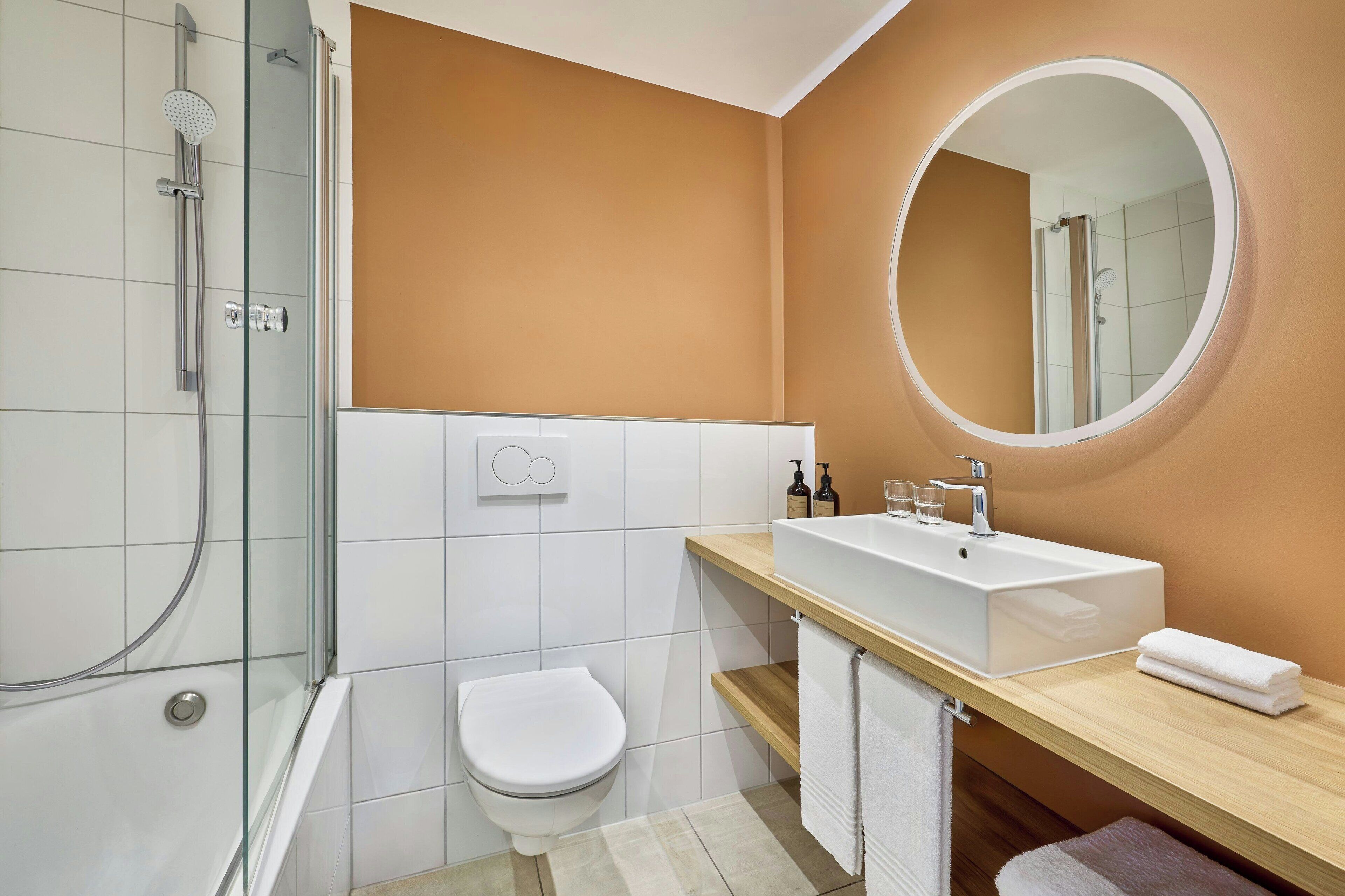 eco-friendly toiletries, hair dryer, towels