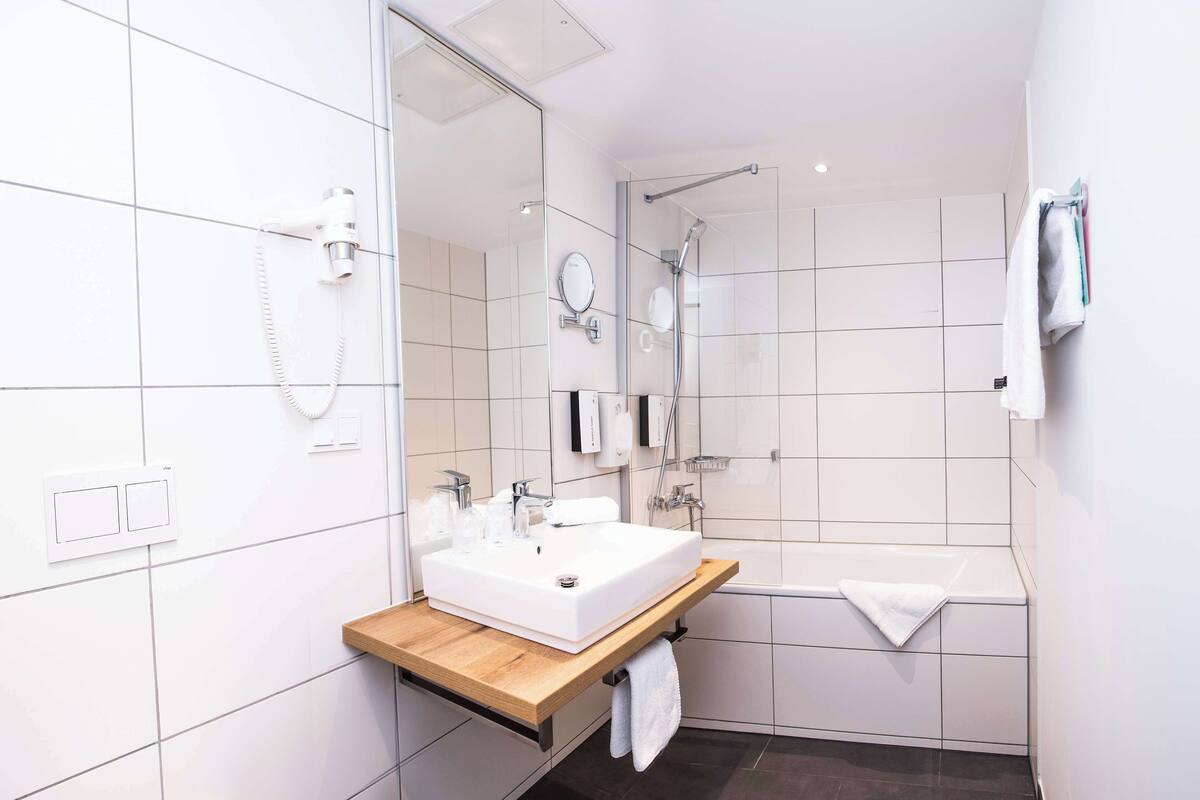 eco-friendly toiletries, hair dryer, bathrobes, bidet