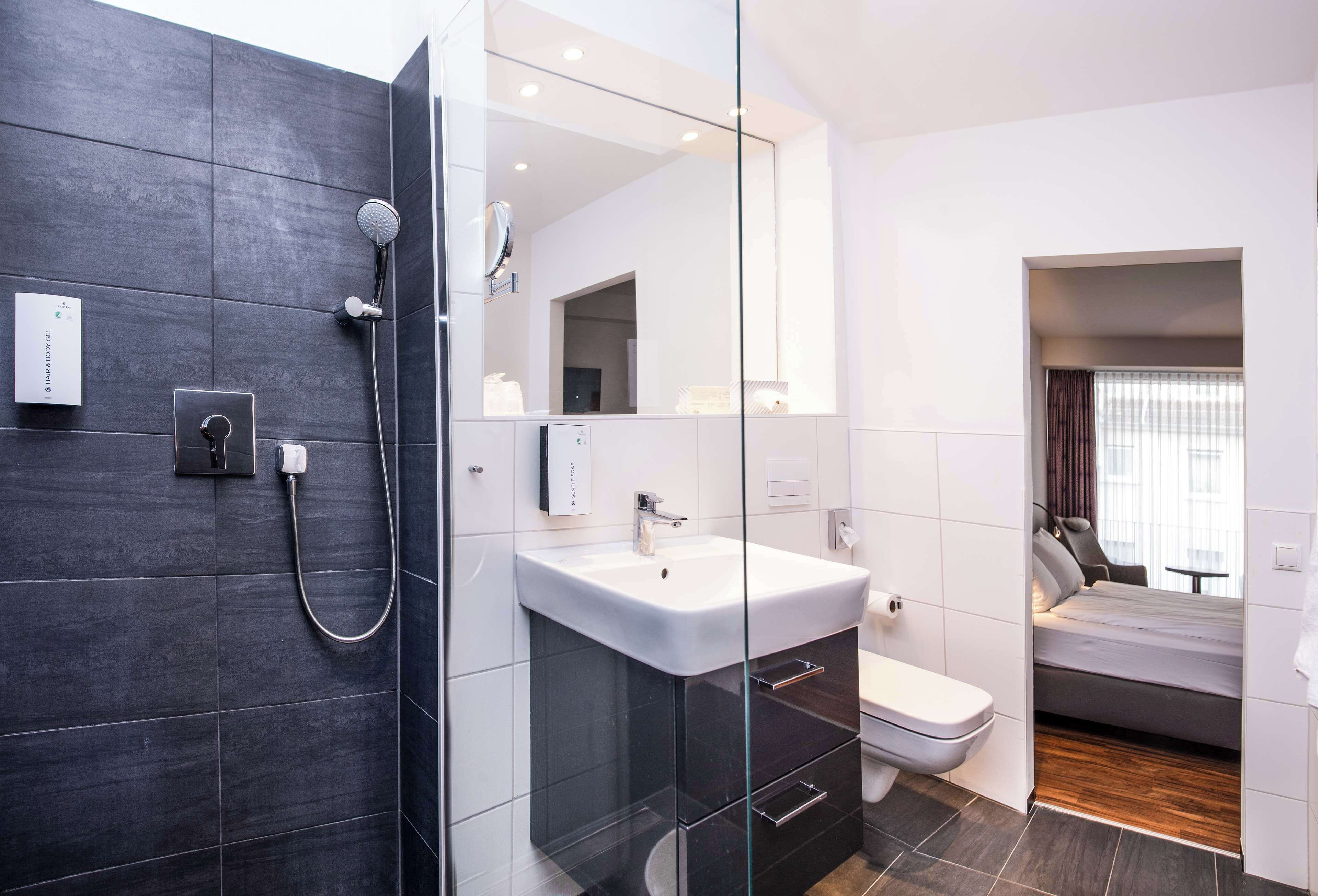 eco-friendly toiletries, hair dryer, bathrobes, bidet