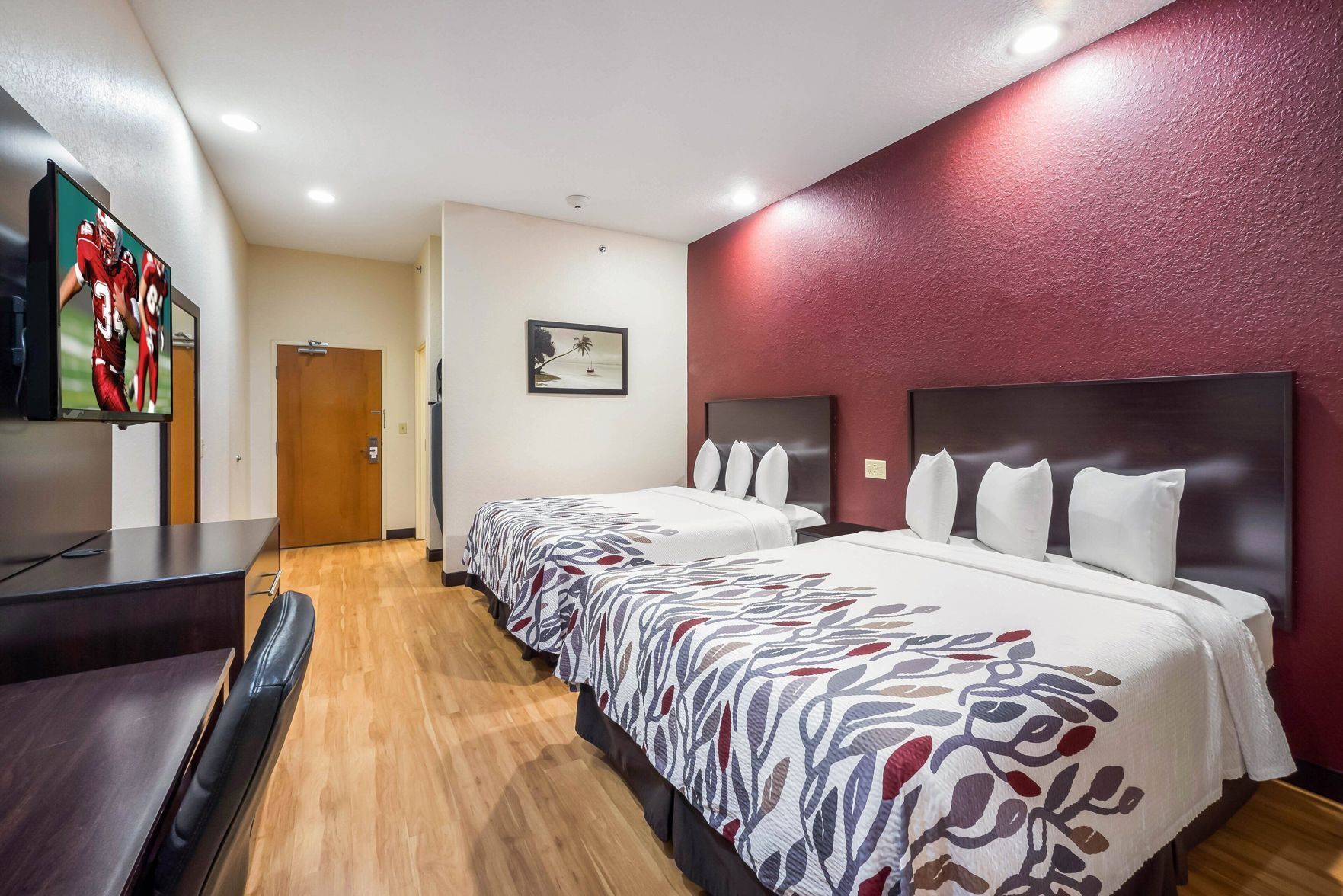 Desk, laptop workspace, blackout drapes, free cribs/infant beds