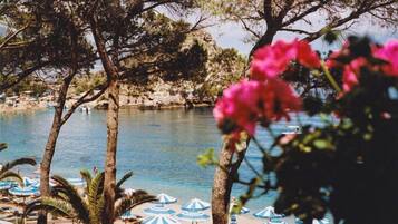Private beach, sun loungers, beach umbrellas, beach towels