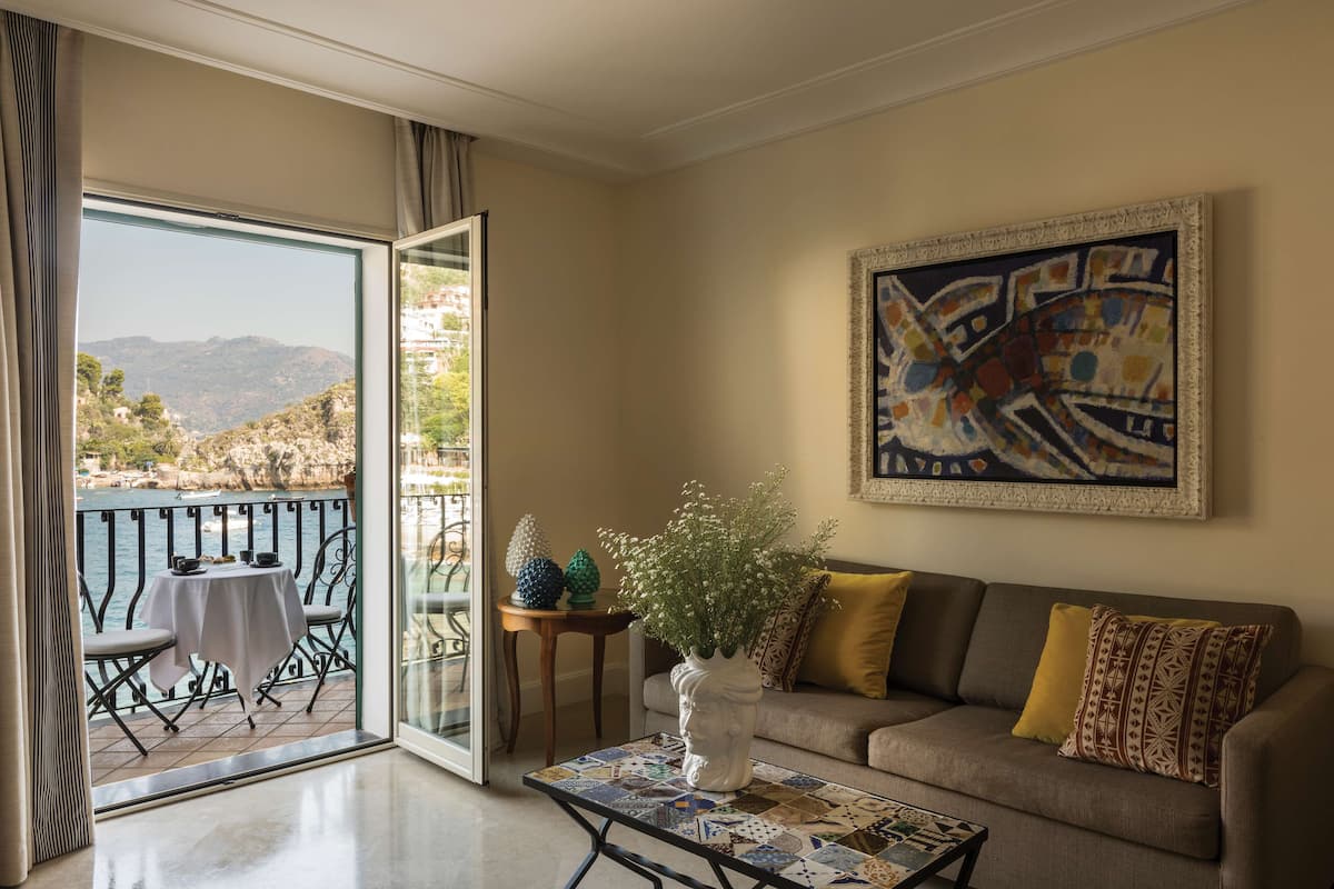 Deluxe Suite, Balcony, Sea View | 1 bedroom, down comforters, minibar, in-room safe
