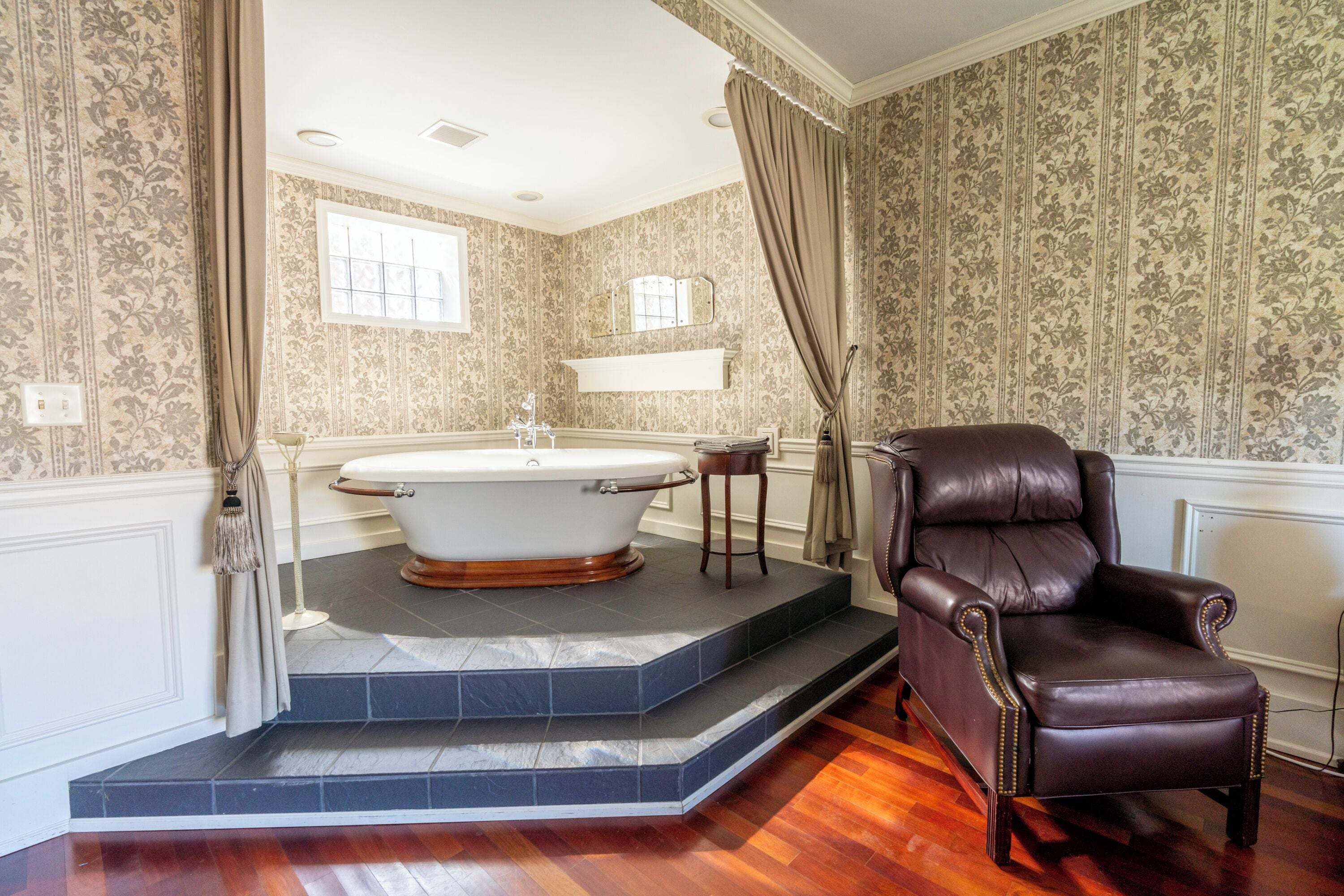 luxury room, 1 king bed, fireplace | deep-soaking bathtub