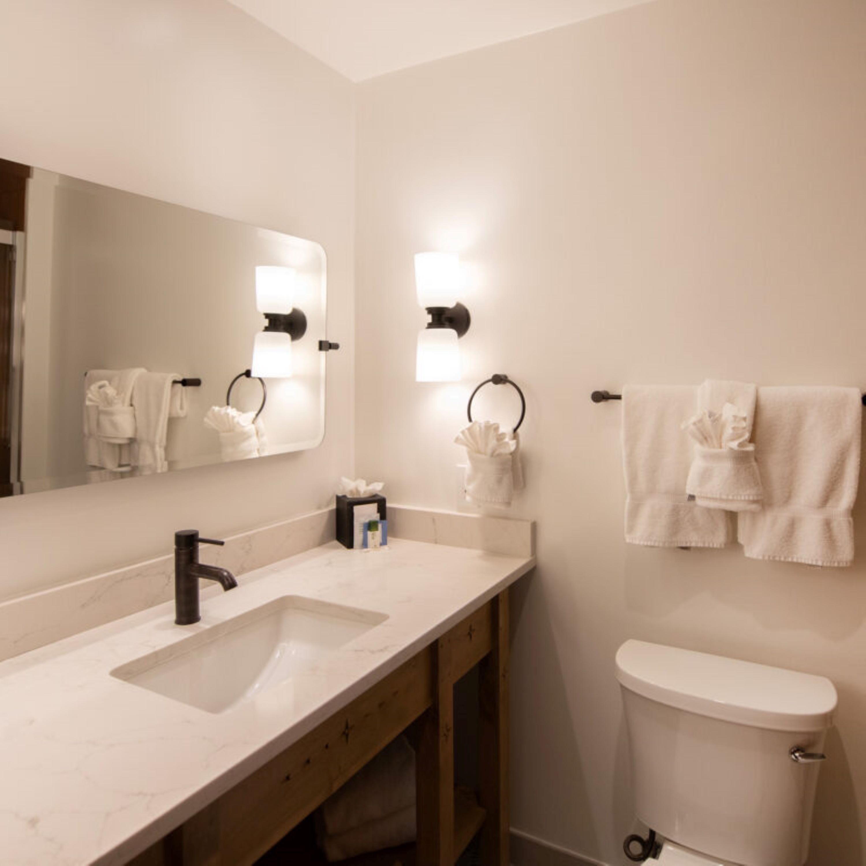 deluxe room, 2 queen beds, fireplace | bathroom | free toiletries, hair dryer, bathrobes, towels